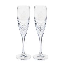 Pair of crystal cut champagne flutes with King Charles III cypher
