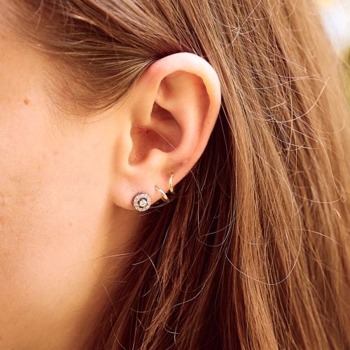 one diamante stud at the centre of the earring with a surrounding circle of diamante