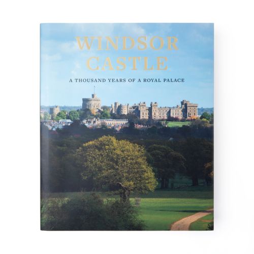 Cover of Windsor Castle: A Thousand Years of a Royal Palace featuring a photo of Windsor Castle from the Great Park. 