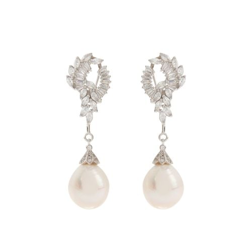 Limited edition Pearl Drop Earrings, featurig two large natural pearls and diamente detailing. 