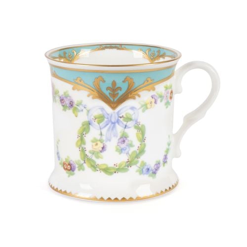 Great Exhibition Tankard with floral and blue detail, next to blue box embossed with "English Fine Bone China" and gold crown. 