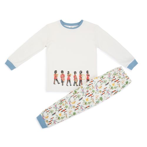 An image of our cotton children's pyjamas suitable for ages between 2 and 7 year-olds featuring blue cuffed pyjama bottoms with a Guards man pattern with trees ,flags and nature. The top features blue cuffs and an illustration of six Guardsmen in uniform 