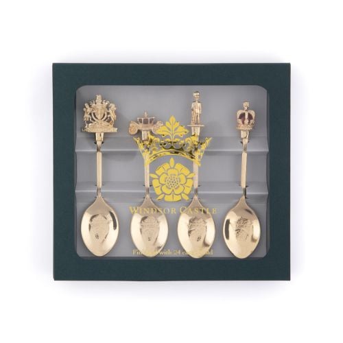 Windsor Castle Souvenir Spoon set with crown and tudor rose and four gold plated spoons featuring the royal crest, carriage, guardsman and crown. 