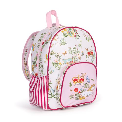 The pink children's backpack, with a floral pattern with a shield, unicorns and crown more with the floral symbols of the four British nations. Pink front pocket with detail of unicorn and royal crown. 