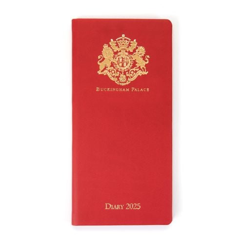 Red pocket diary with gold embossed crest and lettering, Buckingham Palace Diary 2025.