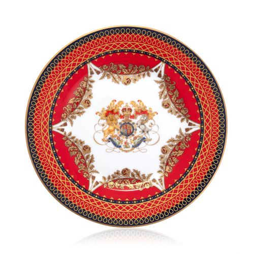 The Livery 8" Dessert Plate featuring the Royal crest at its centre and ornate  and a deep, rich scarlett edge and navy border with contrasting fine gold details, inspired by the intricate decorative braiding of hand-sewn livery and regimental devices of 