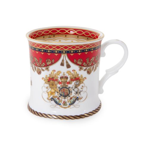 The Livery Takard, featuring the royal coat of arms 
 with a deep, rich scarlett design and navy border with contrasting fine gold details, inspired by the intricate decorative braiding of hand-sewn livery and regimental devices of ceremonial uniforms. 