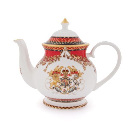 This Livery Teapot featuring the royal coat of arms and a deep, rich scarlet edge and navy border with contrasting fine gold details, inspired by the intricate decorative braiding of hand-sewn livery and regimental devices of ceremonial uniform