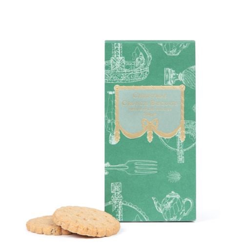 Christmas Crunch Biscuits with green packaging featuring crown pattern with gold detailing and biscuits to the side. 