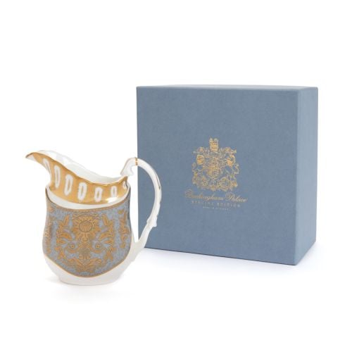 The Acanthus Grey Coffee Cream Jug with ornate gold detailing and handle. 