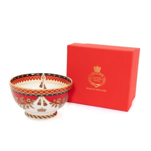 This Livery sugarbowl featuring the royal coat of arms and a deep, rich scarlet edge and navy border with contrasting fine gold details, inspired by the intricate decorative braiding of hand-sewn livery and regimental devices of ceremonial uniform