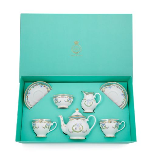 The Great Exhibition fine bone china tea set for two  with a design featuring gold plated rims, gold decorative and pastel coloured floral patterns, featuring two tea cups and saucers, milk jug, sugar bowl and teapot. 