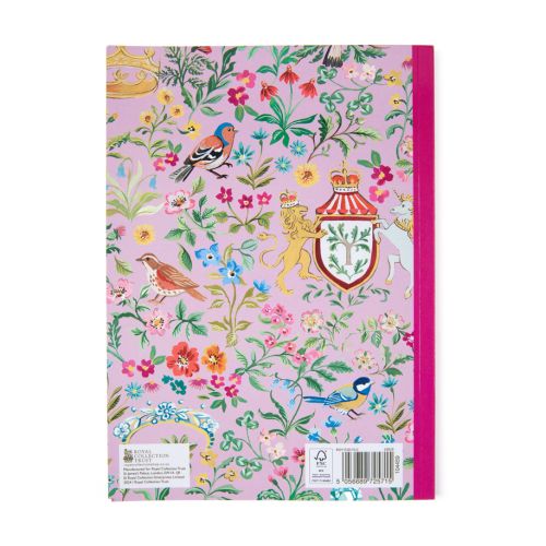 Front of pink note book with pattern featuring flowers, birds, bees, crowns and tiaras. 