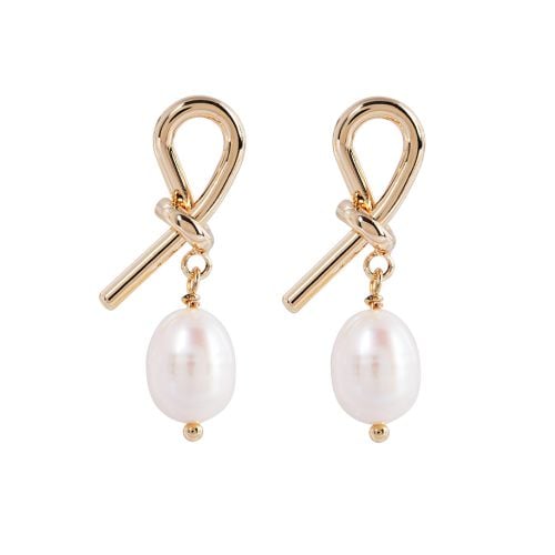 Two old brass shaped  earrings in a knot with a pearl drop. 