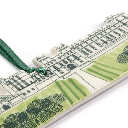 Front of the Clay Windsor Castle Clay Decoration with the Facade of Windsor Castle and green ribbon. 