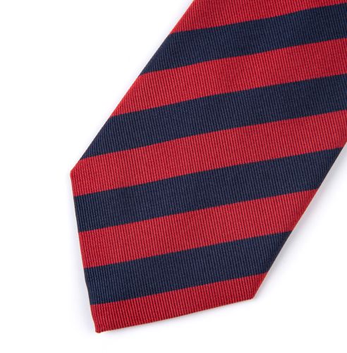 Rolled up navy and red striped tie. 