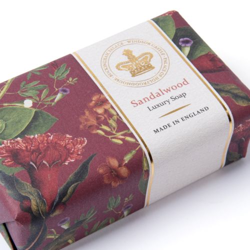 Sandalwood luxury soap with burgundy floral pattern and gold embossed grown. 