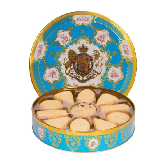 Open shot of the blue and gold round biscuit tin. The tin features the Royal Coat of Arms including a unicorn and a lion.