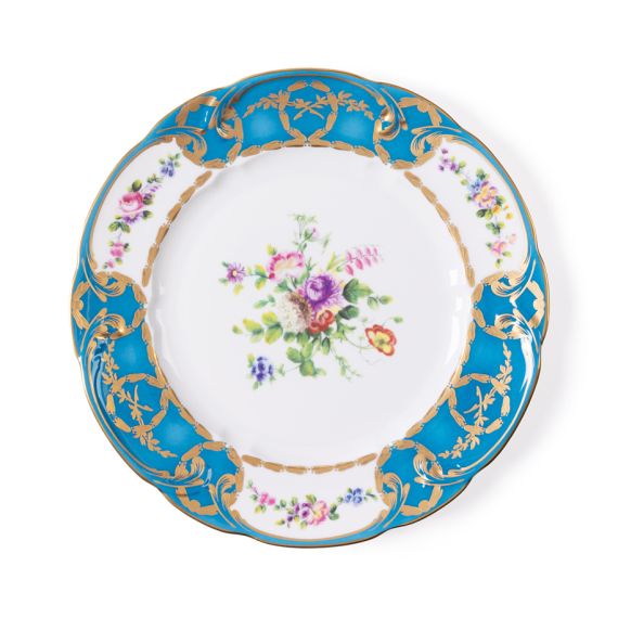 Floral plate with birght turquoise border and floral centrepiece, gilded with gold detailing. 