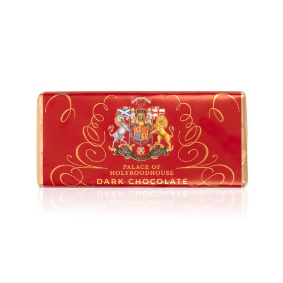 Chocolate bar wrapped in gold foil and red paper with gold foil squiggles. Palace of Holyroodhouse coat of arms at the centre.