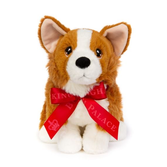 Cuddly corgi with red ribbon