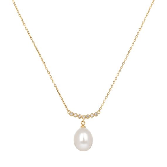 Gold chain with seven small crystals and pearl drop