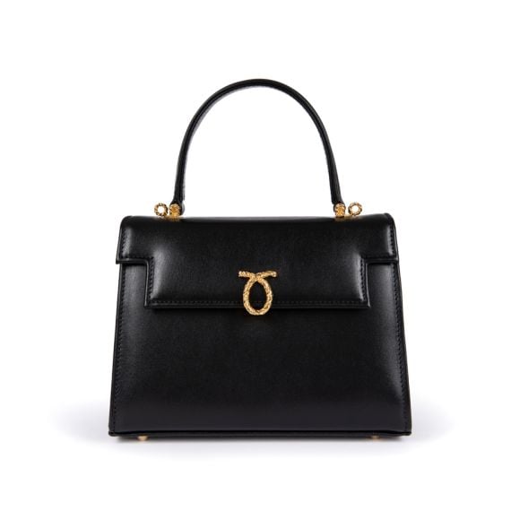 A black leather handbag with top handle and gold coloured clasp