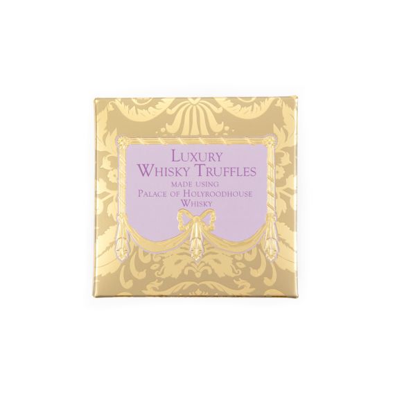 A golden patterned box with with a puple centre, with "Luxury Whisky Truffles, made using Palace of Holyroodhouse Whisky" text at centre in dark purple. 