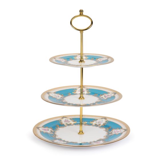 A three tier cake stand, featuring three turquoise plates with floral design and gold detailing. 