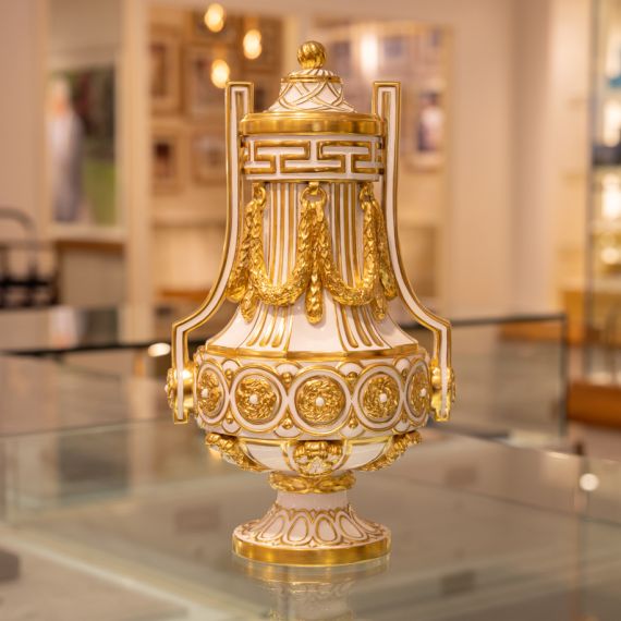 Golden and white Prestige Sèvres Vase with intricate designs and pattern.