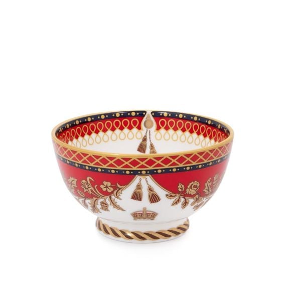 This Livery sugarbowl featuring the royal coat of arms and a deep, rich scarlet edge and navy border with contrasting fine gold details, inspired by the intricate decorative braiding of hand-sewn livery and regimental devices of ceremonial uniform