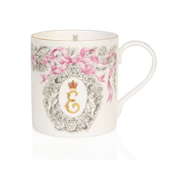 Front of coffee mug with Queen Elizabeth II's personal cypher. Surrounded by a floral design and pink ribbon.